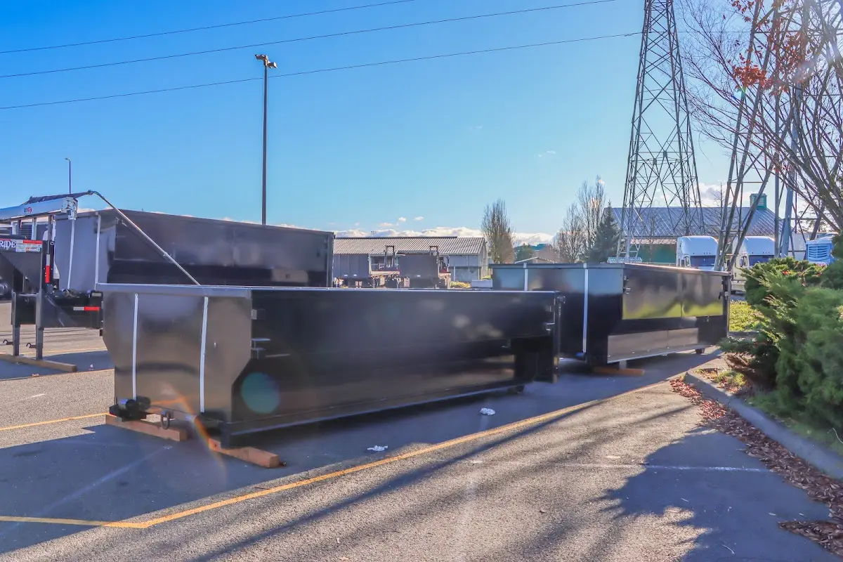 Roll-off dumpster ready for waste disposal at job site for 2 Yard Dumpster Rental in Caln